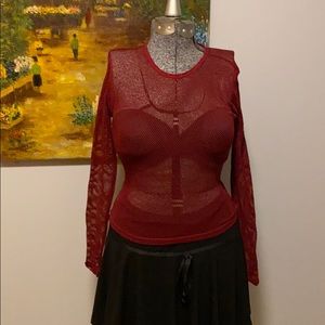 Burgundy fishnet long sleeve top size large.